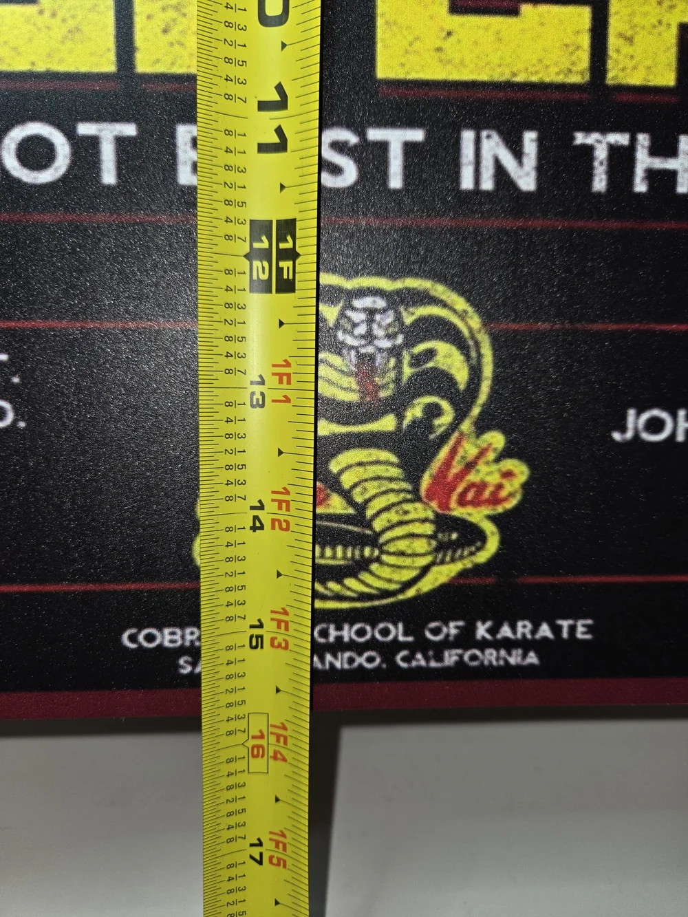 Cobra Kai Metal Sign featuring iconic mottos and the dojo logo as on the TV Show